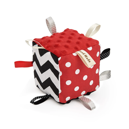 high-contrast baby toy in red, black, and white