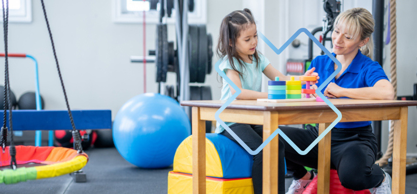 Intervention en physiothérapie pédiatrique visant le développement des préalables scolaires chez un enfant.